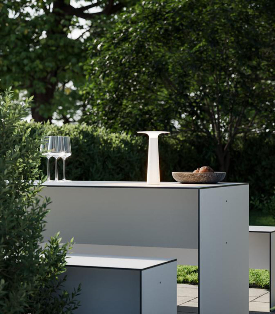 IP44.DE Lix Table Lamp featured within outdoor space