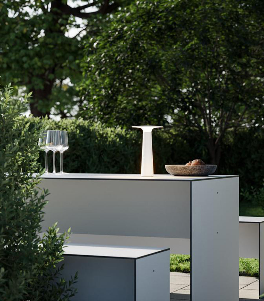 IP44.DE Lix Table Lamp featured within outdoor space