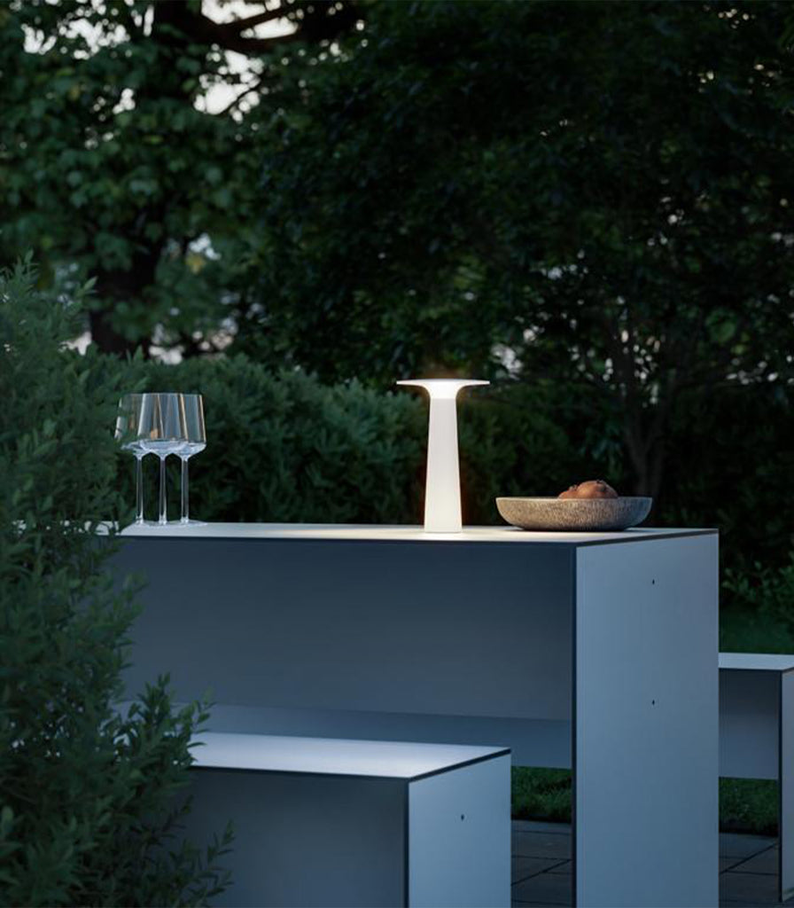 IP44.DE Lix Table Lamp featured within outdoor space