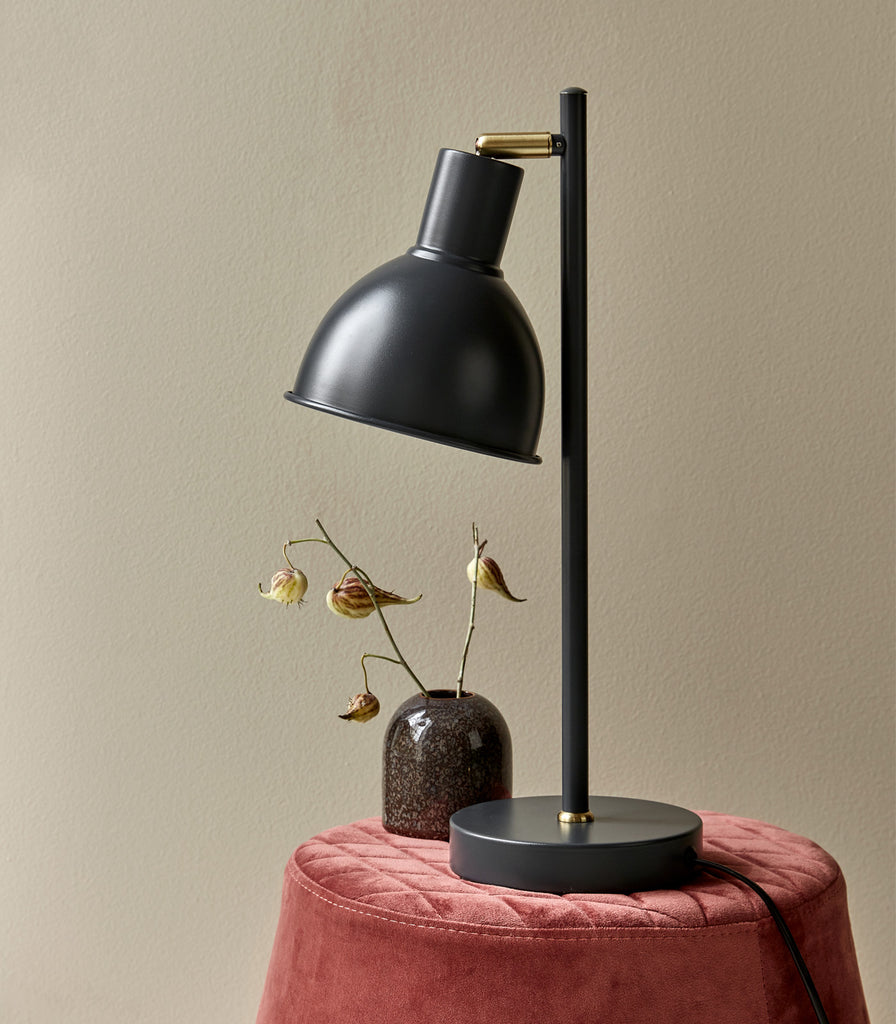 Nordlux Pop Rough Table Lamp featured within interior space