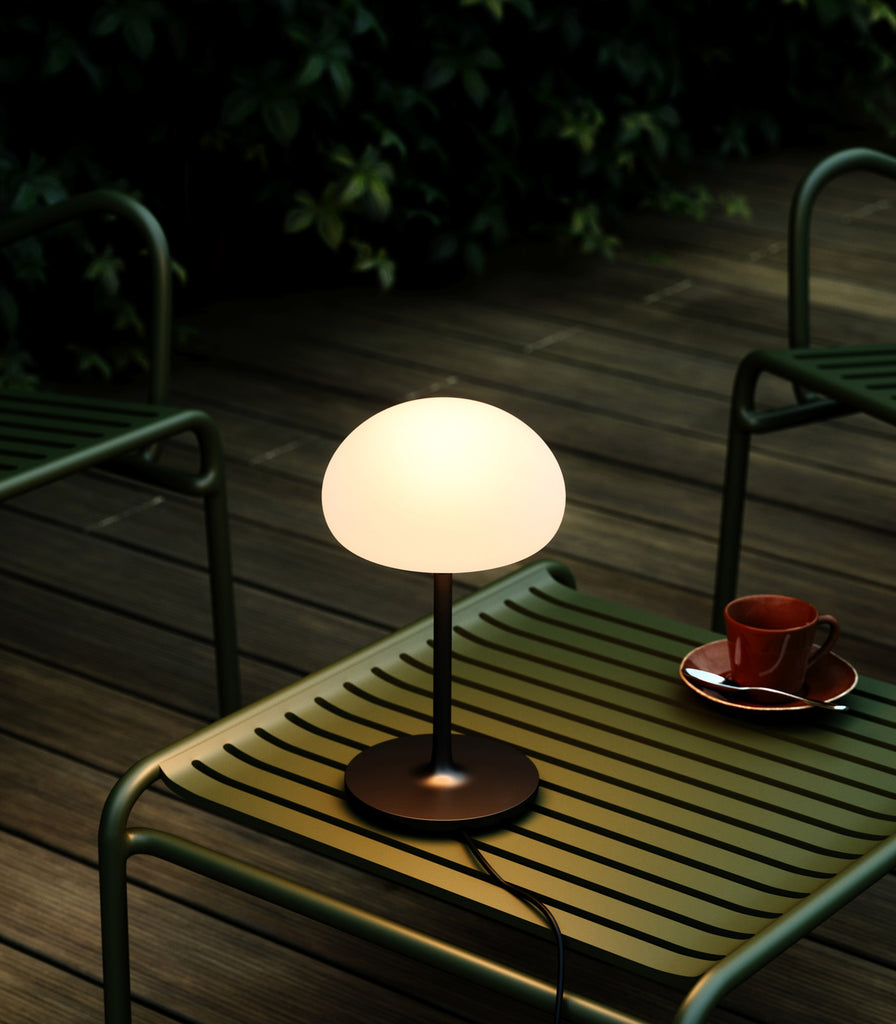 Nordlux Sponge Table Lamp featured within outdoor space