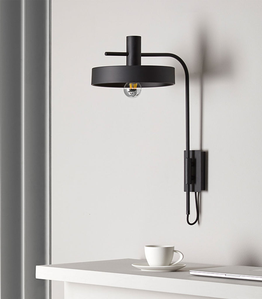 Aromas Aloa Wall Light in Matte Black featured above table