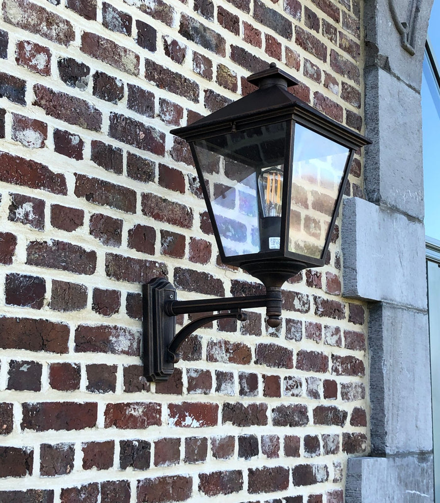 Norlys London Up Arm Wall Light featured within a outdoor space
