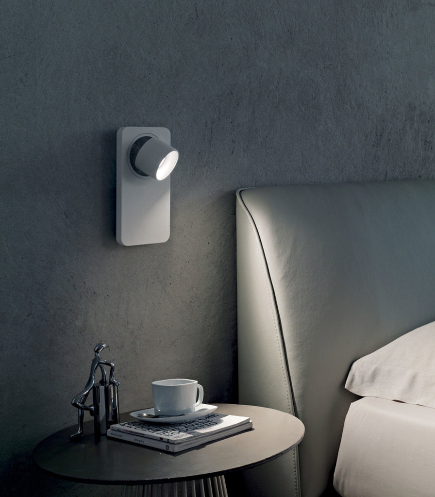 Linea Light Beebo Wall Light featured above bedside table