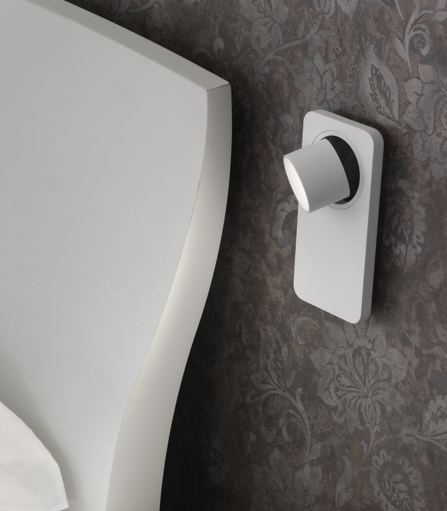 Linea Light Beebo Wall Light featured above bedside table