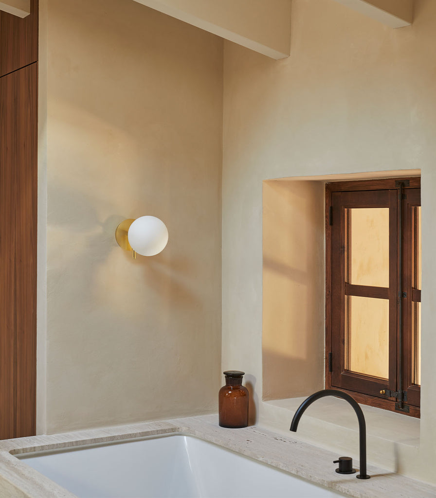 Aromas Atom Wall Light featured in bathroom