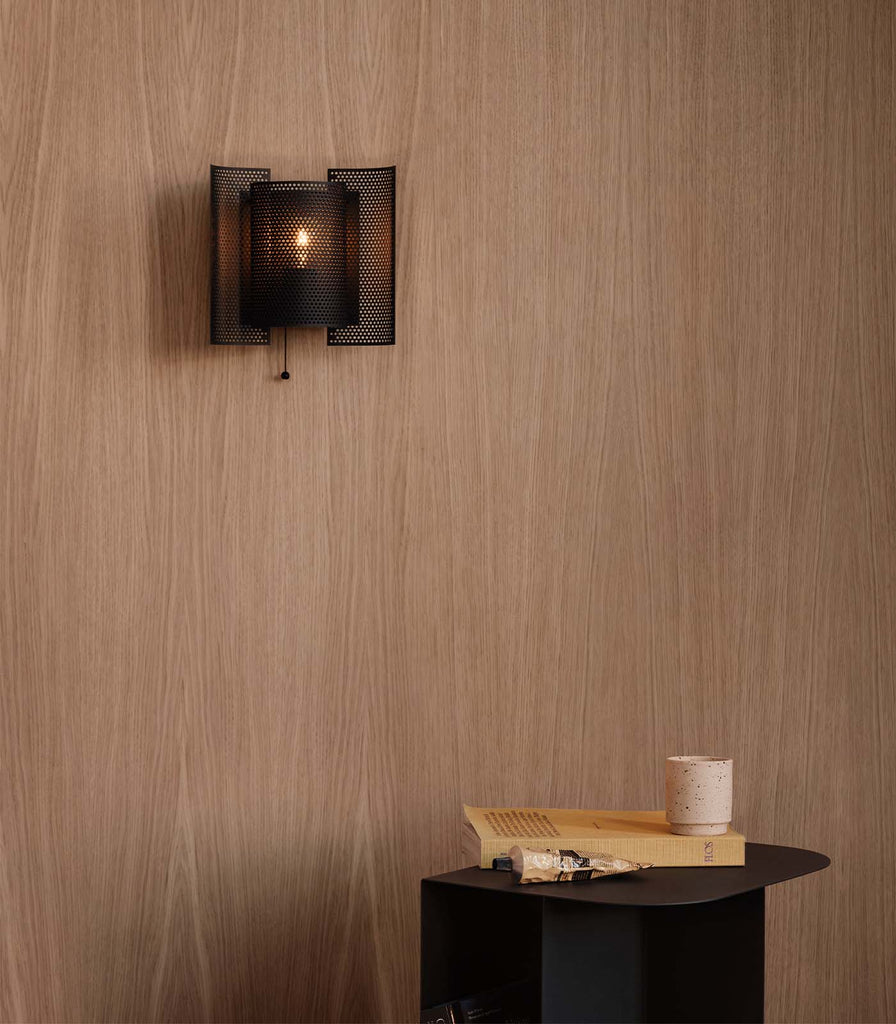 Northern Butterfly Perforated Wall Light featured within a interior space