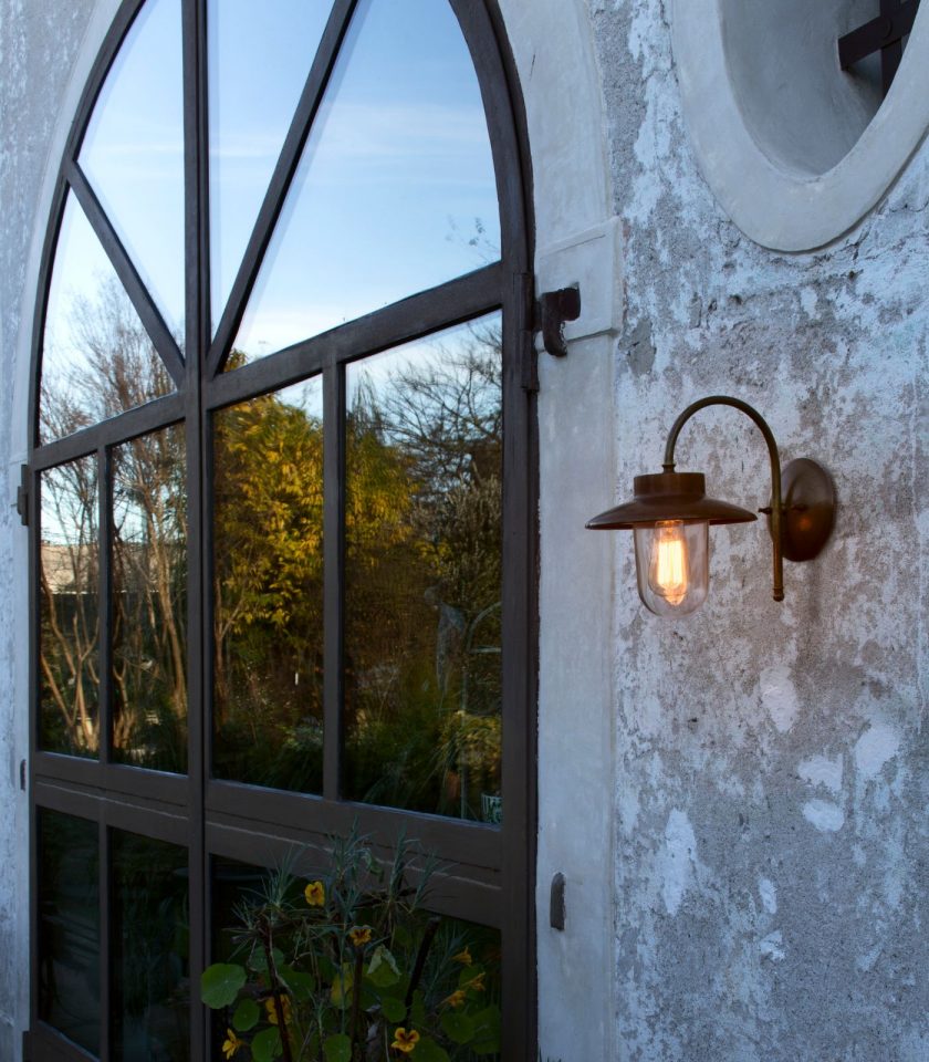 Il Fanale Calmaggiore Wall Light featured within a outdoor space