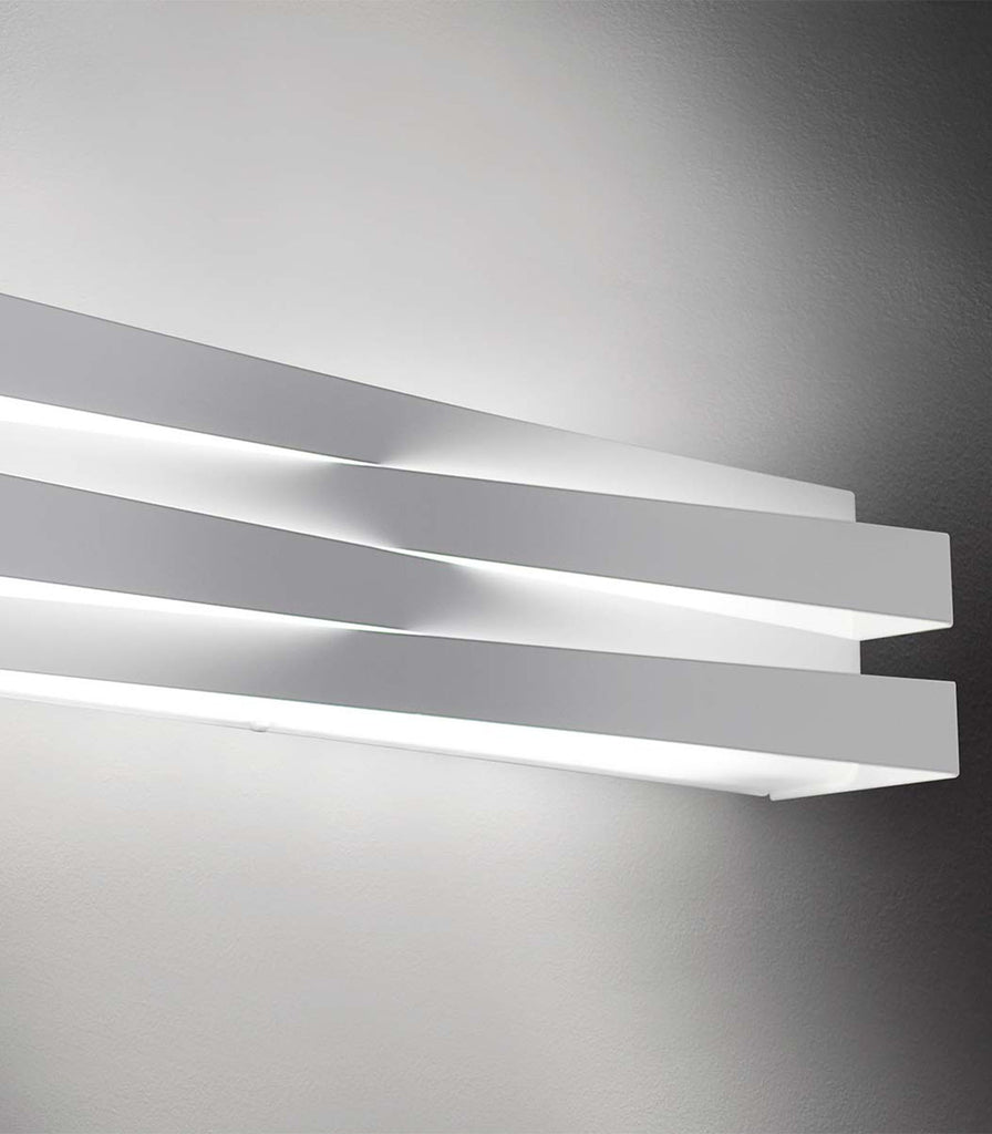 Panzeri Cross Wall Light featured within a interior space