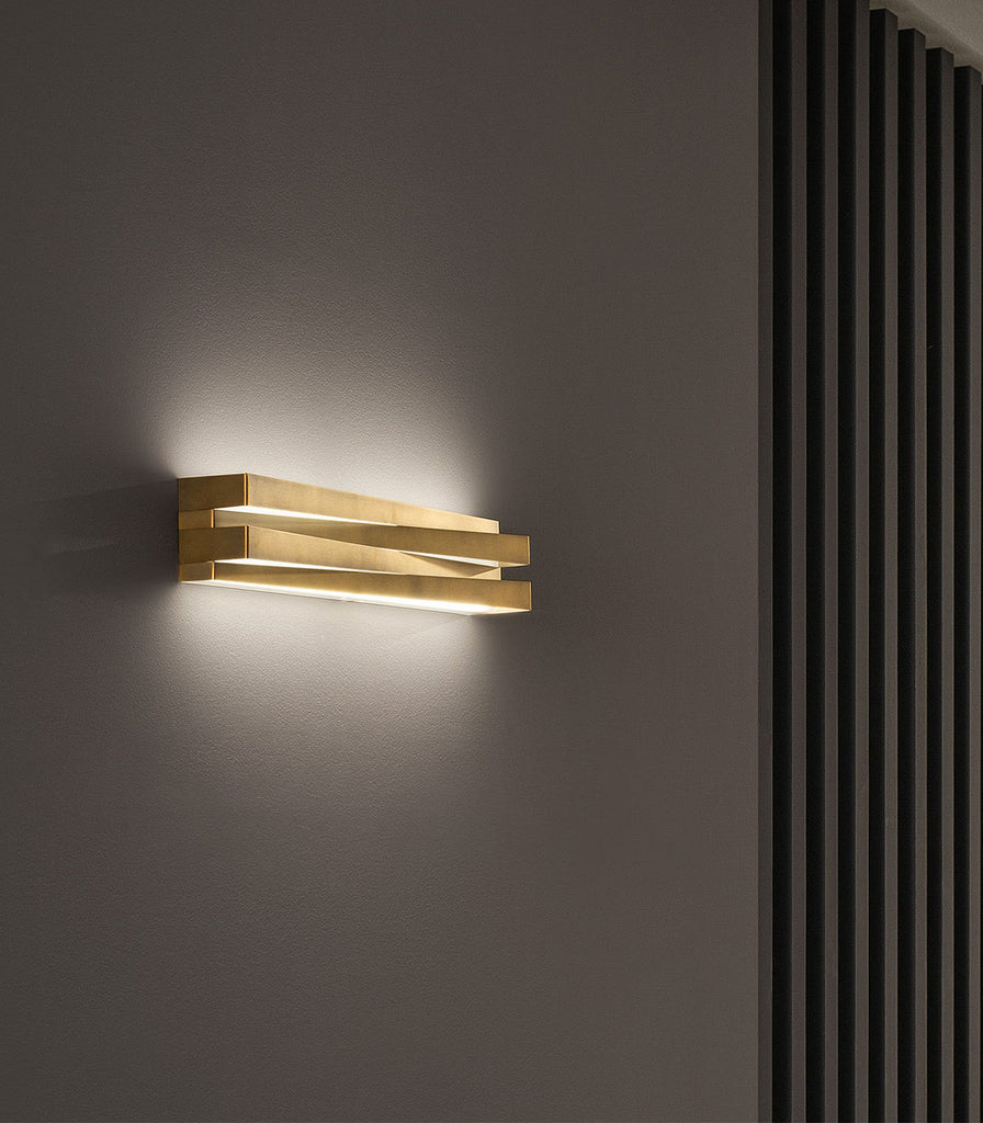 Panzeri Cross Wall Light featured within a interior space