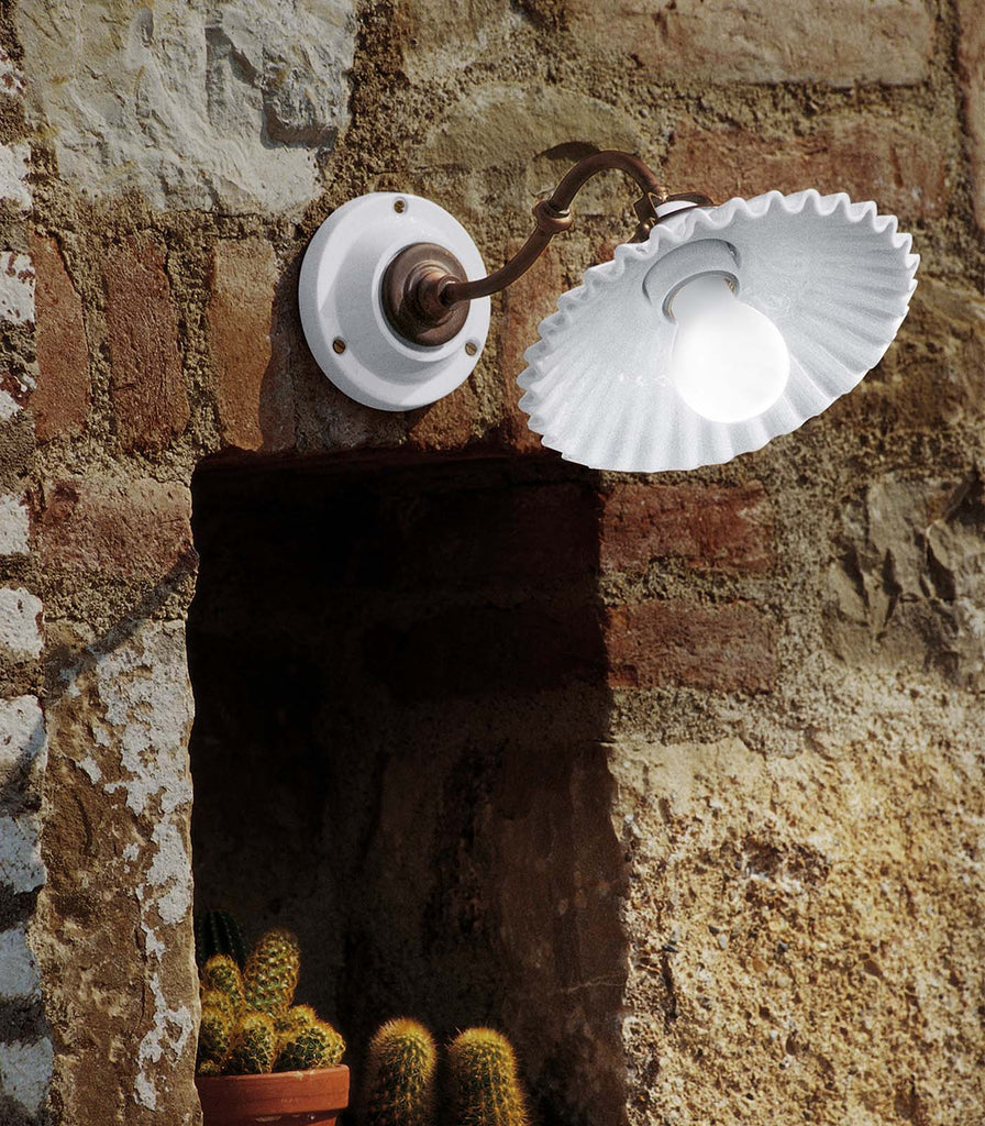 Aldo Bernadi Duse Wall Lightfeatured within outdoor space