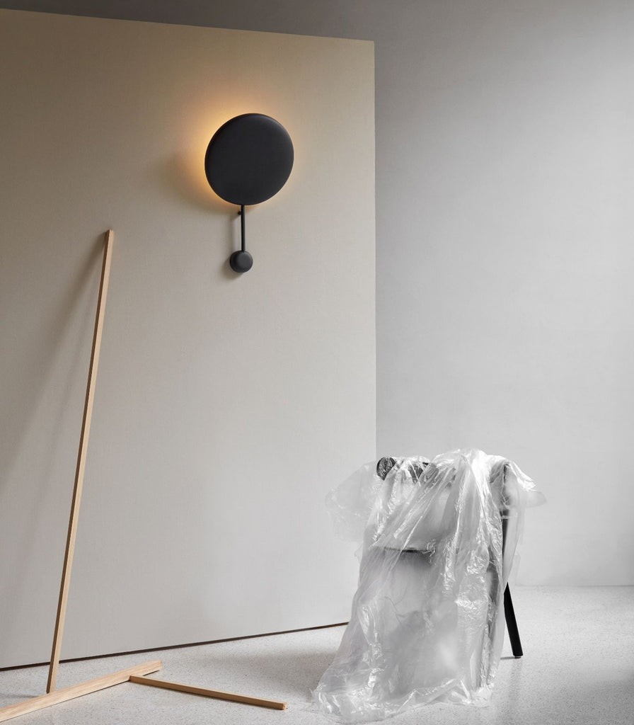 Northern Ink Wall Light featured within a interior space