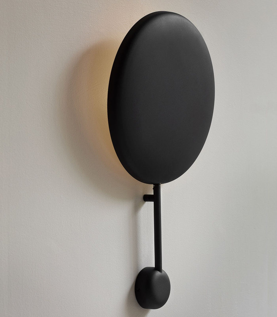 Northern Ink Wall Light featured within a interior space