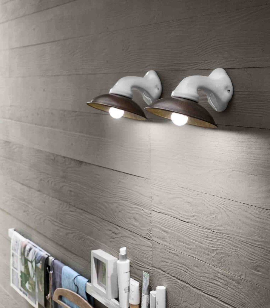 Il Fanale Mini Wall Light featured within a interior space