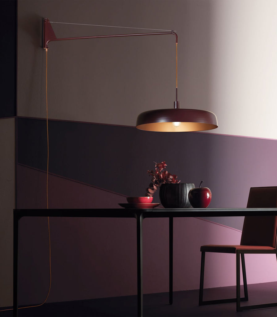 Oty MoMa Bi Color Arm Wall Light in Small/Rose featured within a interior space