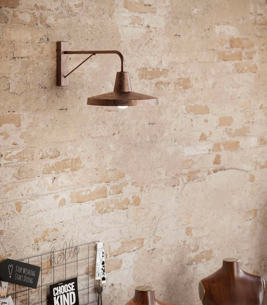 Il Fanale Officina Wall Light featured within a interior space