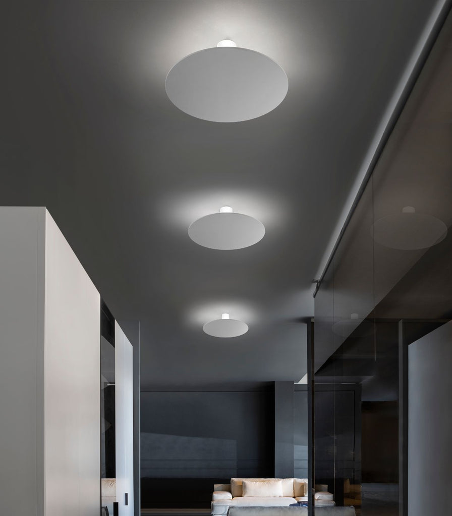 Lodes Puzzle Mega Round Wall/Ceiling Light featured within a interior space