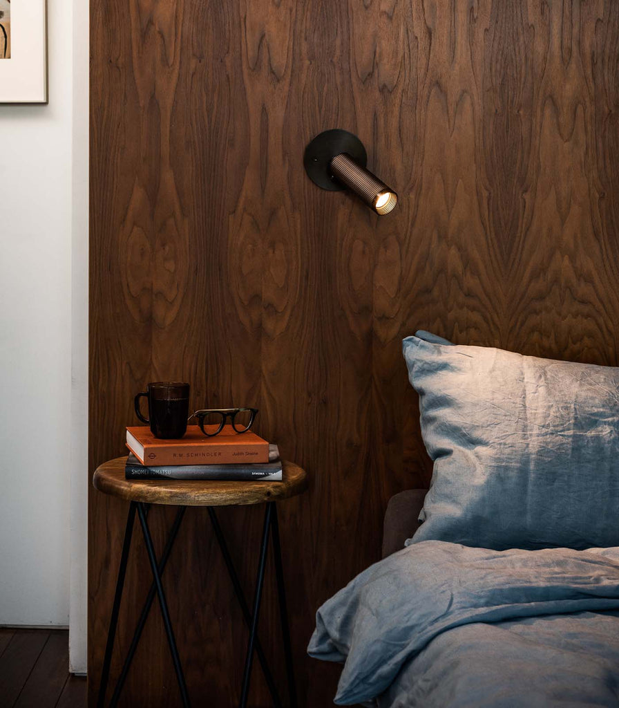 J. Adams & Co. Spot Wall Light featured above bedside table