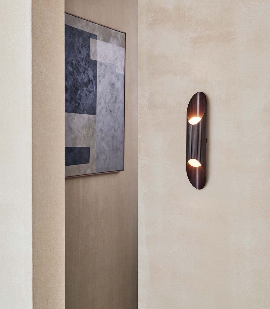  J. Adams & Co. Vector Wall Light featured in an interior space