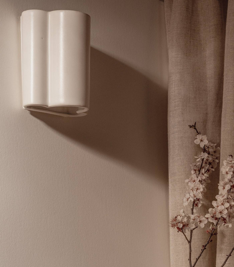 Cloud Wall Light by We Ponder in eggshell white in an interior setting