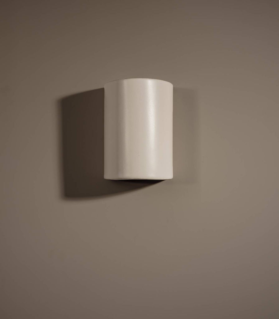 We Ponder Dawn Short Wall Light in Eggshell White off