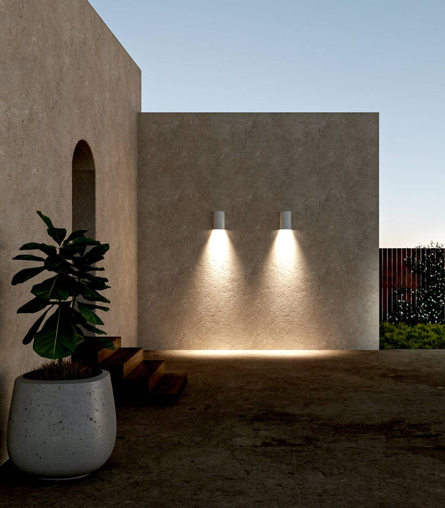 We Ponder Dawn Short Outdoor Wall Light in an exterior setting