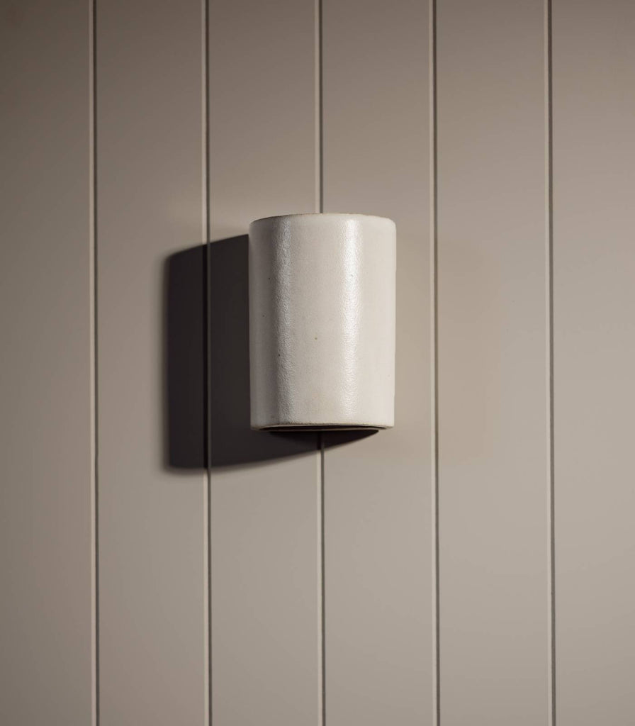 We Ponder Dawn Short Outdoor Wall Light in Eggshell White