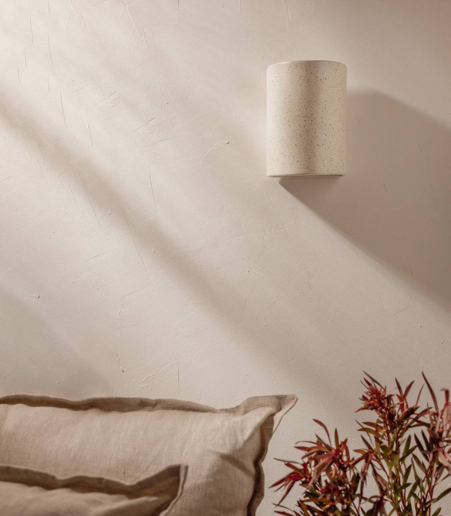 We Ponder Freckles Short Wall Light in Beige/Fleck finish in an interior setting
