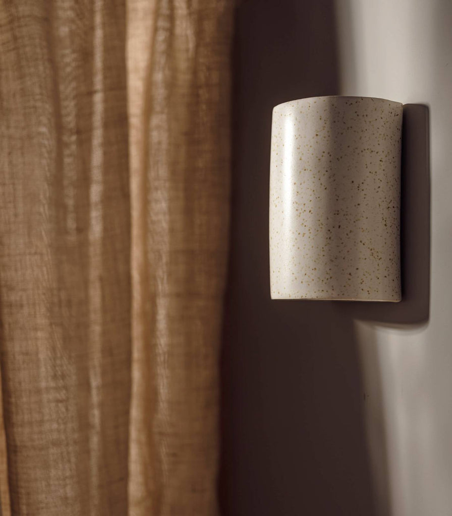 We Ponder Freckles Short Wall Light in Beige/Fleck finish in interior setting