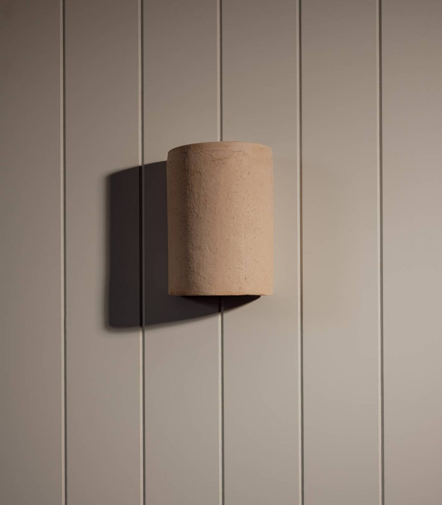 We Ponder Nudie Outdoor Wall Light in Raw Clay finish